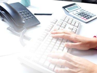 Office worker at computer desk