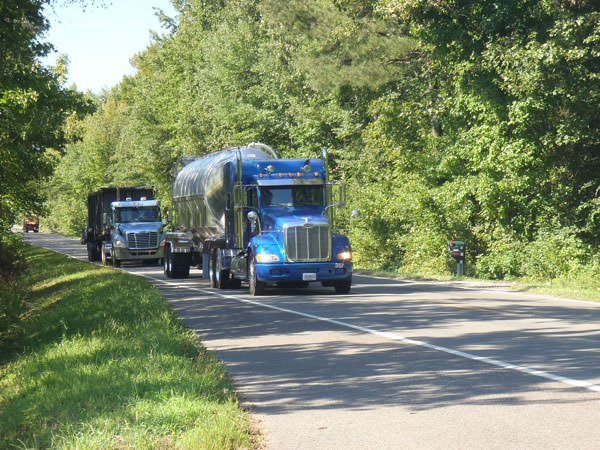 ABC trucks driving down highway